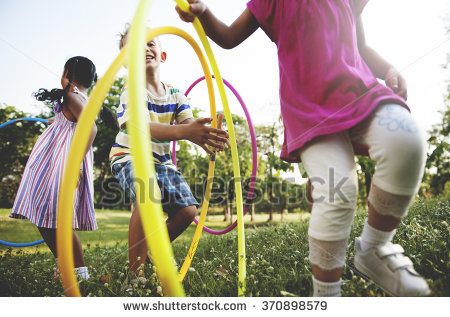 Children playing with hula hoops