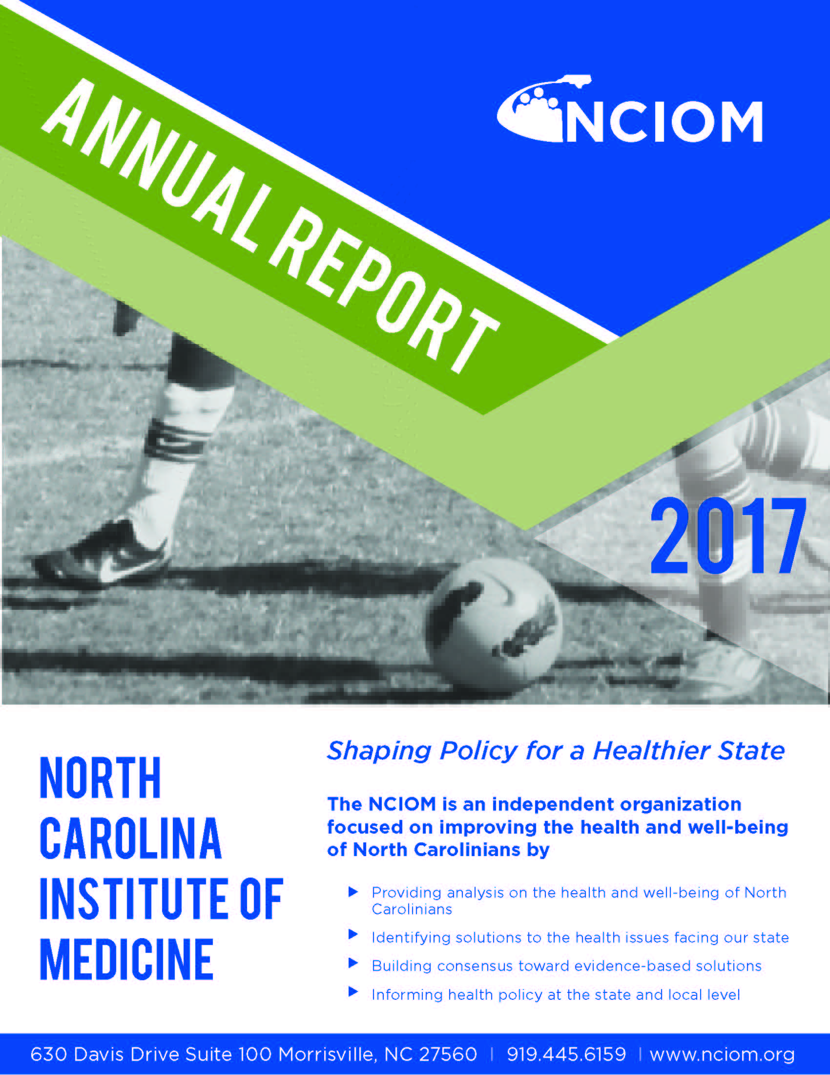 annual report cover with feet kicking soccer ball