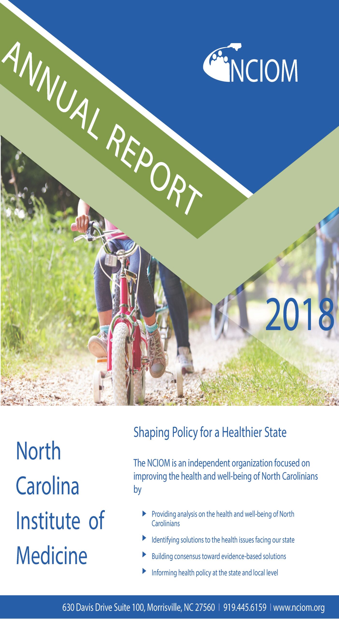 annual report cover with image of people riding bikes