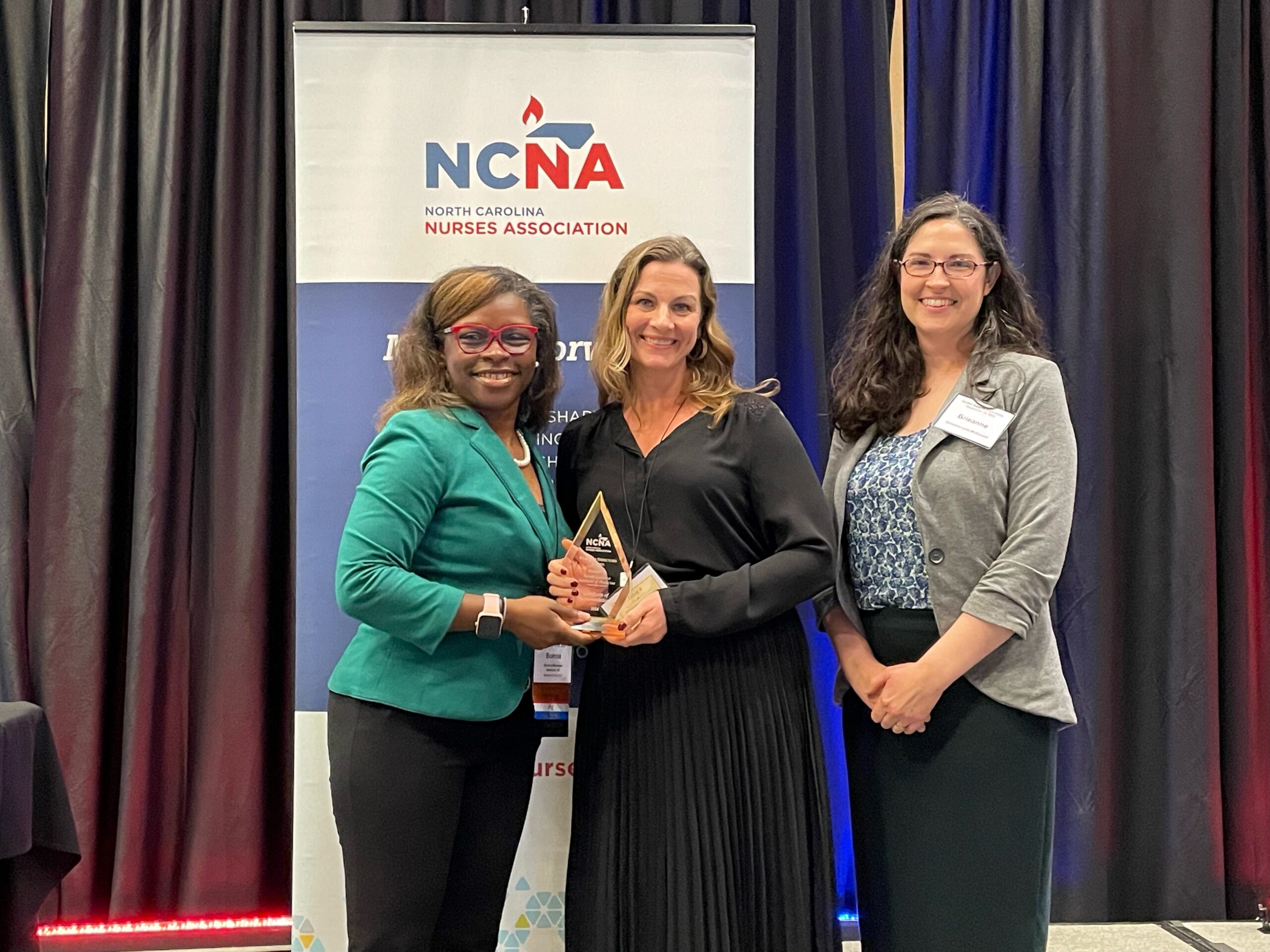 NCNA President Elect Bonnie Meadows (l) poses with NCIOM President & CEO Michelle Ries (center) and NCIOM Project Director Brieanne Lyda-McDonald, MSPH (r)